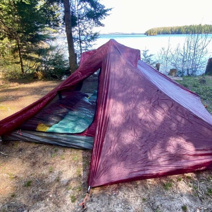 An ultralight backpacking tent at a campsite.